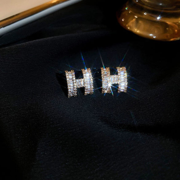Wholesale Silver Needle Earrings With Real Gold Electroplated Metal Letter Pattern Light Luxury Style