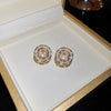 Wholesale Silver Needle Earrings With Real Gold Electroplated Metal Letter Pattern Light Luxury Style