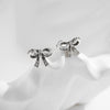 Wholesale Silver Sweet Cool Style Bow Shiny Diamond Earrings For Women With Old Craft