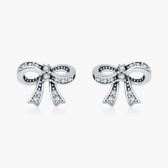 Wholesale Silver Sweet Cool Style Bow Shiny Diamond Earrings For Women With Old Craft