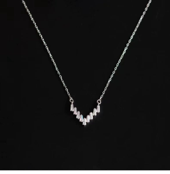 Wholesale 225 Silver Vshaped Women's Light Luxury Necklace With Small Skirt Pendant Inlaid With Square Zircon And Plated With 14K Gold And Chain With Letters Numbers Text Pattern