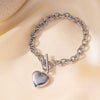 Wholesale Simple And Popular Ot Buckle Glossy Titanium Steel Heart Pendant Necklace With Love Water Drops Bells Pattern Electroplated For Women