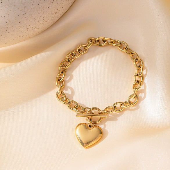 Wholesale Simple And Popular Ot Buckle Glossy Titanium Steel Heart Pendant Necklace With Love Water Drops Bells Pattern Electroplated For Women