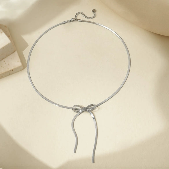 Wholesale Simple Geometric Bow Design Electroplated Titanium Steel Snake Bone Chain Bracelet For Women