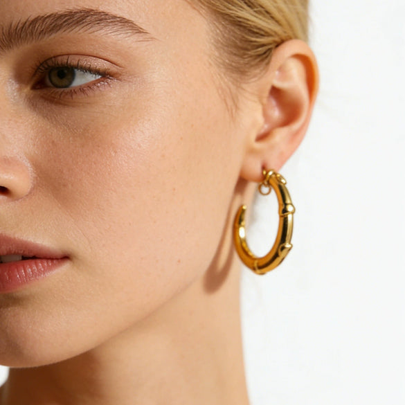 Wholesale Simple Modern Style Heartshaped Embossed Cshaped Stainless Steel Electroplated 18K Nonfading Gold Earrings For Women
