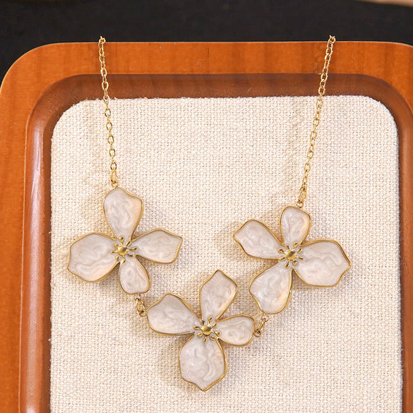 Wholesale Simple Plants And Flowers Dripping Oil Stainless Steel Flower Necklace And Earrings Set For Women