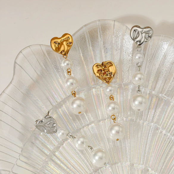 Wholesale Simple Retro Heart Shaped Pearl Tassel Earrings In Stainless Steel With Electroplating