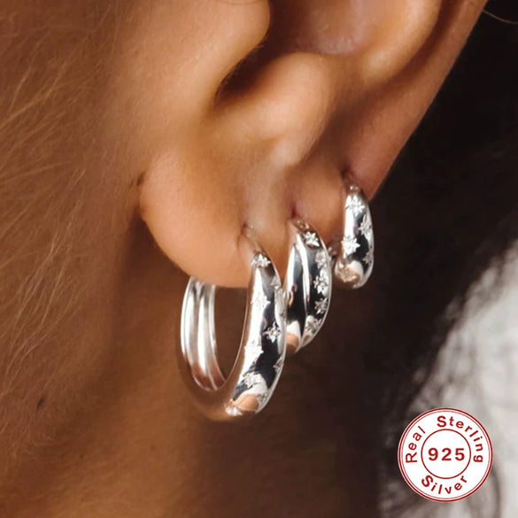 Wholesale Simple S925 Sterling Silver Fivepointed Star And Eightpointed Star Earrings With Electroplating