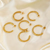 Wholesale Simple Stainless Steel Cshaped Goldplated Electroplated Women's Twist Earrings