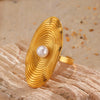 Wholesale Stainless Steel And Pearl Geometric Oval Rotating Stripes Inlaid Ring With Electroplating For Women
