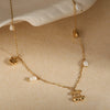 Wholesale Stainless Steel And Titanium Steel Cherry Fruit Flower Tassel Pendant Necklace With Electroplating For Women