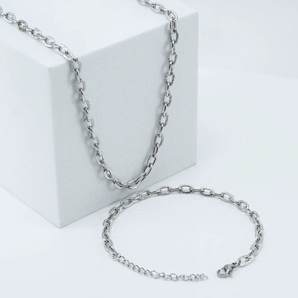 Wholesale Stainless Steel And Titanium Steel Cross Chain Jewelry With Embossed Design And Electroplating Treatment