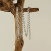 Wholesale Stainless Steel And Titanium Steel Cross Chain Jewelry With Embossed Design And Electroplating Treatment