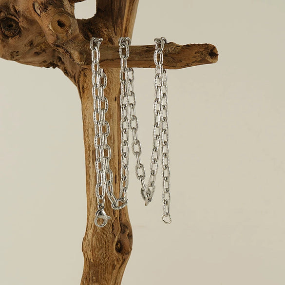 Wholesale Stainless Steel And Titanium Steel Cross Chain Jewelry With Embossed Design And Electroplating Treatment