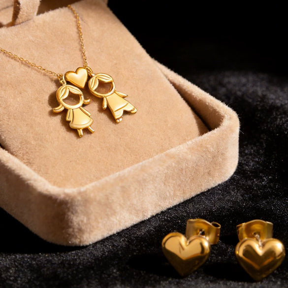Wholesale Stainless Steel And Titanium Steel Heartshaped Electroplated Earring And Necklace Set For Boys And Girls