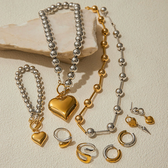 Wholesale Stainless Steel And Titanium Steel Jewelry With Heart Water Drop And Bell Patterns Electroplated Love Necklace And Non Fading Earrings For Women