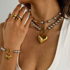 Wholesale Stainless Steel And Titanium Steel Jewelry With Heart Water Drop And Bell Patterns Electroplated Love Necklace And Non Fading Earrings For Women