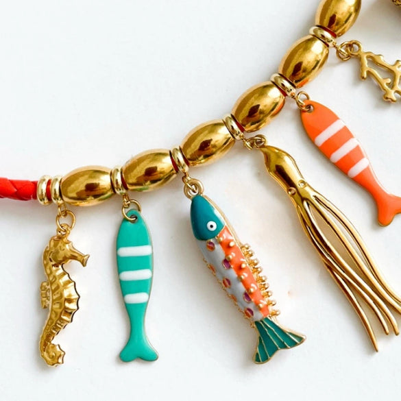 Wholesale Stainless Steel Animal Multi Pendant Necklace With Electroplating Seahorse Octopus Conch Clownfish Design