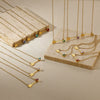 Wholesale Stainless Steel Birthstone Necklace With Arrow Piercing Heart Pendant Electroplated In 18K Gold