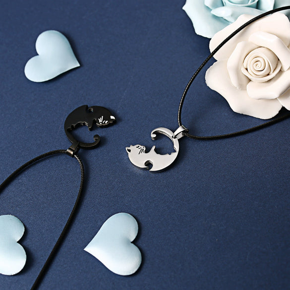 Wholesale Stainless Steel Black And White Cat Pendant Necklace Creative Kitten Hug Shape Couple Style Electroplated With Leather Rope
