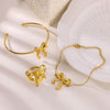 Wholesale Stainless Steel Bow Earrings And Clavicle Chain Set With 18K Gold Electroplating For Women