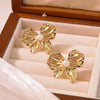 Wholesale Stainless Steel Bow Earrings With Simple Design And Polish Finish For Women