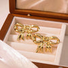 Wholesale Stainless Steel Bow Earrings With Simple Design And Polish Finish For Women