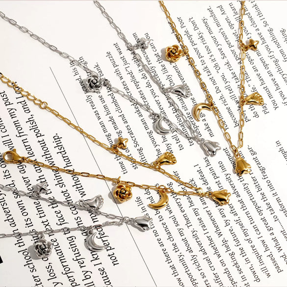 Wholesale Stainless Steel Bracelet And Necklace Set With Simple Animal Pendant In Penguin Paw Moon Flower Bear Pig Shapes Electroplated