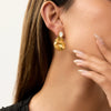 Wholesale Stainless Steel Drop Shaped Cat's Eye Stone Earrings With 18K Gold Electroplating For Women Quiet Design Sense Minimalist Style