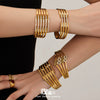 Wholesale Stainless Steel Electroplated Hollow Geometric Line Inlaid Mud Diamond Spring Open Bracelet