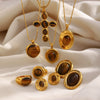 Wholesale Stainless Steel Electroplated 18K Gold Geometric Cross Necklace And Oval Earrings For Women