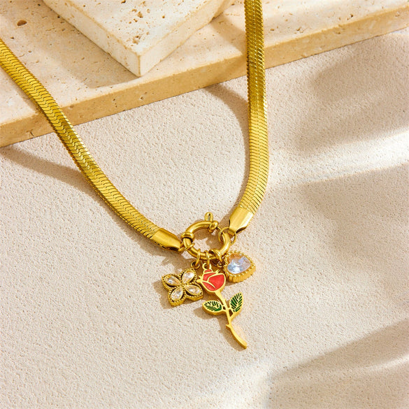 Wholesale Stainless Steel Fashion Retro Snake Bone Chain Oil Dropping Rose Pendant Necklace With Gold Plated And Flower Pattern