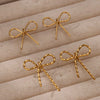 Wholesale Stainless Steel Geometric Bow Earrings With Electroplating