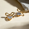 Wholesale Stainless Steel Geometric Bow Earrings With White Zircon And Electroplating