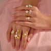 Wholesale Stainless Steel Geometric Flower Pearl Open Ring Plated 18K Gold