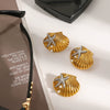 Wholesale Stainless Steel Geometric Ocean Wind Hammer Starfish Rib Shell Earrings For Women With Electroplating Treatment