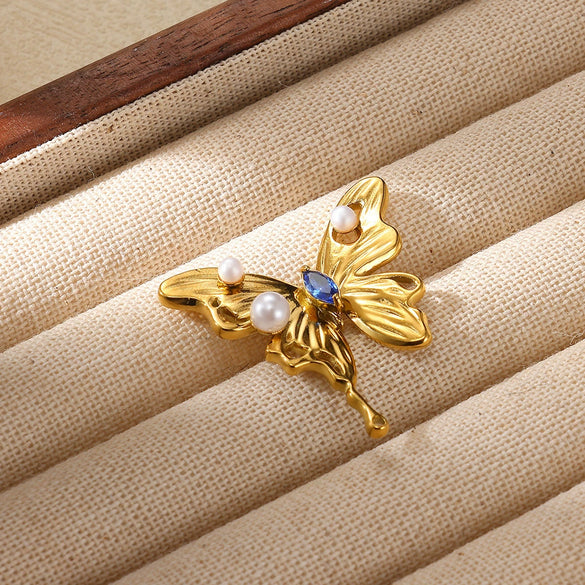 Wholesale Stainless Steel Gold Plated Letter Shaped Butterfly Brooch With Zircon And Imitation Pearl Electroplated