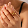 Wholesale Stainless Steel Goldplated Geometric Hollow Open Ring For Women With Knot And Cross Design
