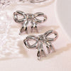 Wholesale Stainless Steel Hollow Bow Earrings For Women Seiko Design