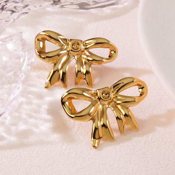 Wholesale Stainless Steel Hollow Bow Earrings For Women Seiko Design