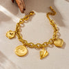 Wholesale Stainless Steel Jewelry Women's Bracelet With Goldplated Retro Fashion Round Plate Wave Conch Fish Tail Pendant And Animal Zodiac Pattern