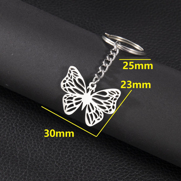 Wholesale Stainless Steel Keychain With Geometric Round Volleyball Football And Animal Bear Little Pig Pendants Electroplated