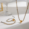 Wholesale Stainless Steel Metal Ball And Cross Necklace And Bracelet Set With 18K Vacuum Plating