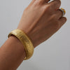 Wholesale Stainless Steel Open Bracelet With Chubby Hammer Pattern Electroplated In 18K Gold Quiet Design Modern Minimalist Style