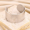 Wholesale Stainless Steel Open Bracelet With Geometric Concave And Convex Pattern And Electroplating Design