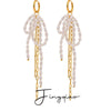 Wholesale Stainless Steel Pearl Bow Tassel Earrings With 18K Gold Electroplating Quiet Design And Elegant Temperament