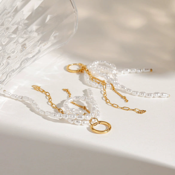 Wholesale Stainless Steel Pearl Bow Tassel Earrings With 18K Gold Electroplating Quiet Design And Elegant Temperament