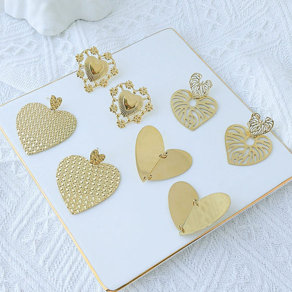 Wholesale Stainless Steel Retro Geometric Asymmetric Love Hollow Stitching Heart Shape Electroplating Women's Earrings