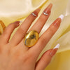 Wholesale Stainless Steel Ring With Oval Texture Hollow And Open Design Geometric Pattern Electroplated