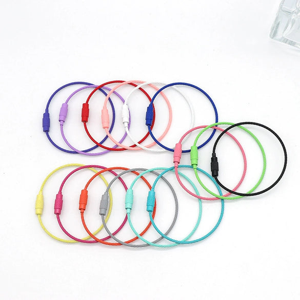 Wholesale Stainless Steel Rotating Key Ring Key Chain With Baking Paint And Geometric Style
